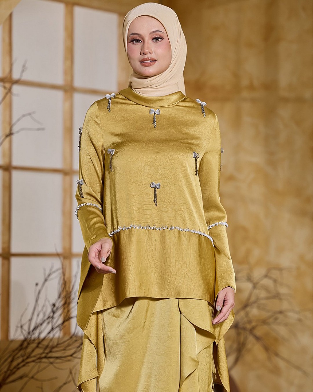 ALAIA IN GOLDEN YELLOW