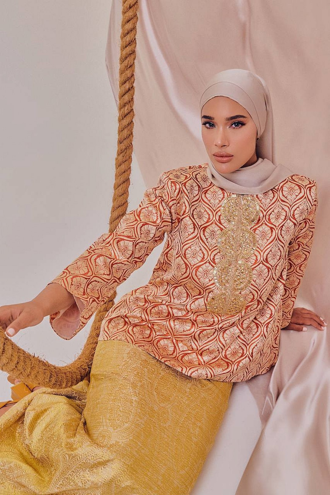 KANIKHA KURUNG KEDAH IN ORANGE GOLD