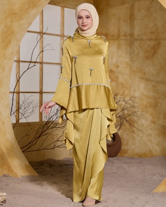 ALAIA IN GOLDEN YELLOW